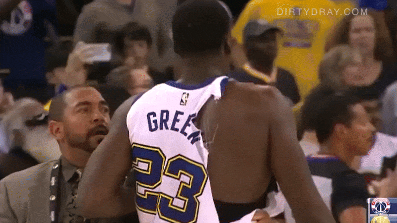 draymond green with ripped jersey backing away after skirmish